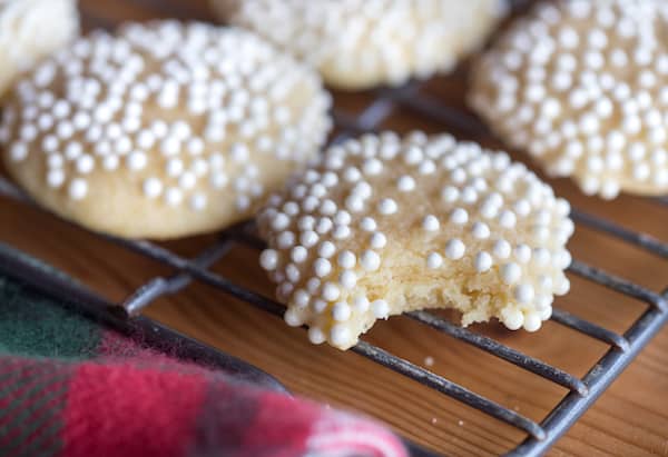Perfectly Chewy Sugar Cookies with the Focus on One Cookie Missing a Bite