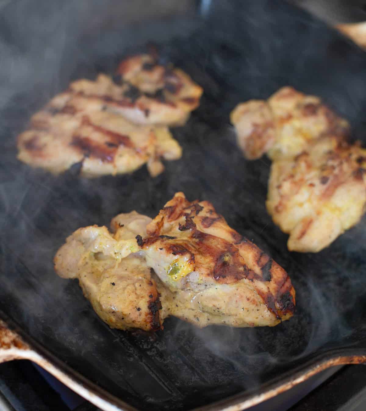 Grilled Mango Chicken on the grill