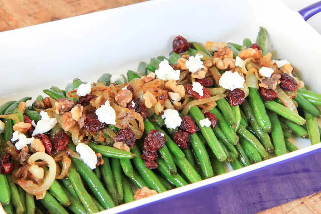 Brown Sugar Glazed Green Beans with Caramelized Onions, Cranberries, Walnuts and Goat Cheese Beautifully Arranged and Ready to Be Served