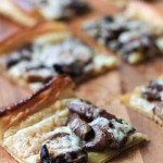 Mushroom Havarti Flatbread on the Wooden Board Cut in Square Bites