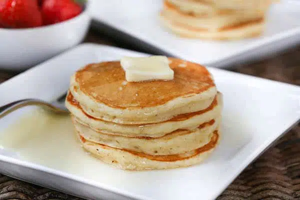 The Fluffiest Buttermilk Pancakes with Buttermilk Sauce