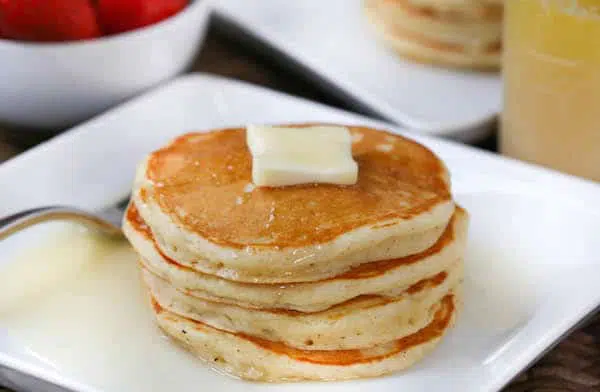 The Fluffiest Buttermilk Pancakes with Buttermilk Sauce