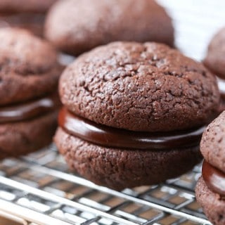 Delicious closeup on the Triple Chocolate Sandwich Cookies looking absolutely stunning with some amazing texture