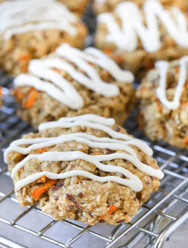 Carrot Cake Breakfast Cookies All Ready to Be Served with White Delicious Frosting on Top