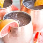 Grapefruit Moscow Mules - with Grapefruit Juice Dripping over the Table