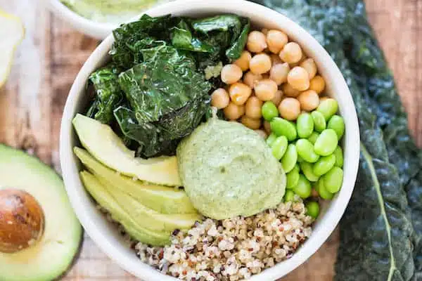 Green Goddess Quinoa Bowls - One More Closeup Shot from Above with Avocado and Greens Next to the Bowl