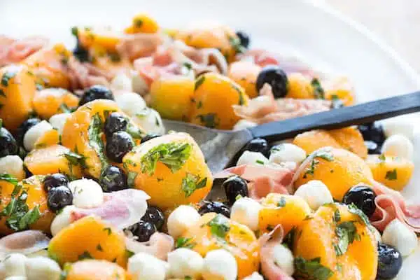 Cantaloupe Blueberry and Prosciutto Summer Salad