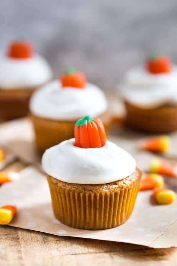 Pumpkin Cupcakes with Cream Cheese Frosting and a Tiny Cute Pumpkin on Top