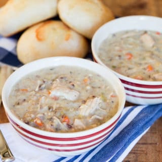 Slow Cooker Creamy Turkey Wild Rice Soup with Buns on the Table