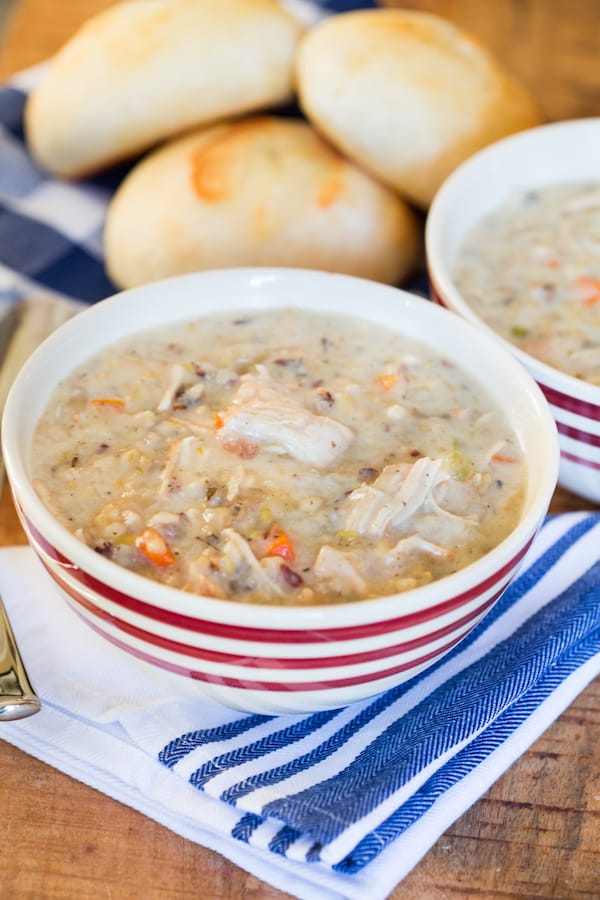 Slow Cooker Turkey Wild Rice Soup with Buns in the Background