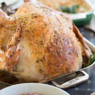 Garlic and Herb Mayonnaise Roasted Turkey Served for the Delightful Family Dinner