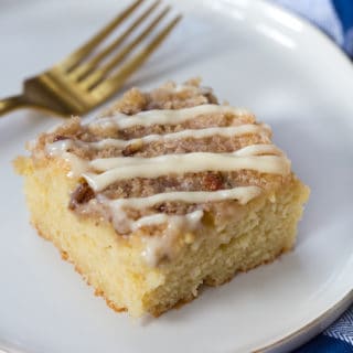 Eggnog Coffee Cake with Cream Cheese Glaze - Beautifully Decorated with Blue and White Fabric