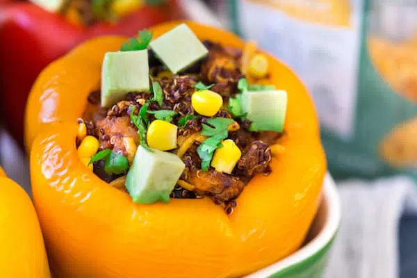 Mexican Chicken and Quinoa Stuffed Peppers Major Closeup on the Mouthwatering Ingredients of the Yellow Pepper