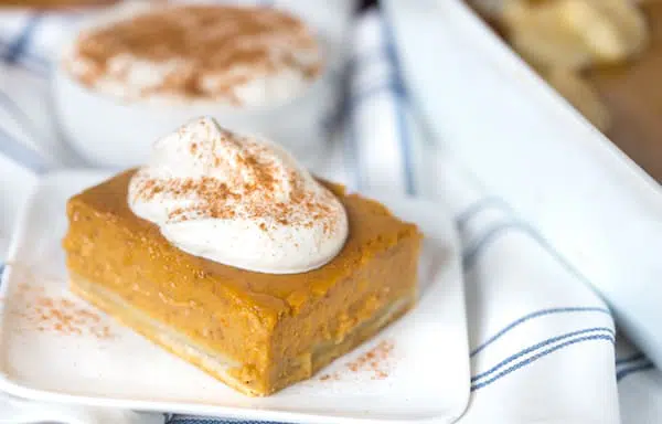 Pumpkin Pie Bars with Maple Whipped Cream on Top - Delicious Fall Dessert