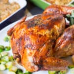 Sage Butter Roasted Turkey Served in a White Plate with Various Sides