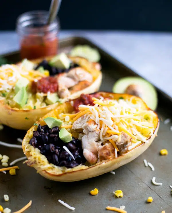 Spaghetti Squash Chicken Burrito Bowls Served in a Tray with Avocado on the Side