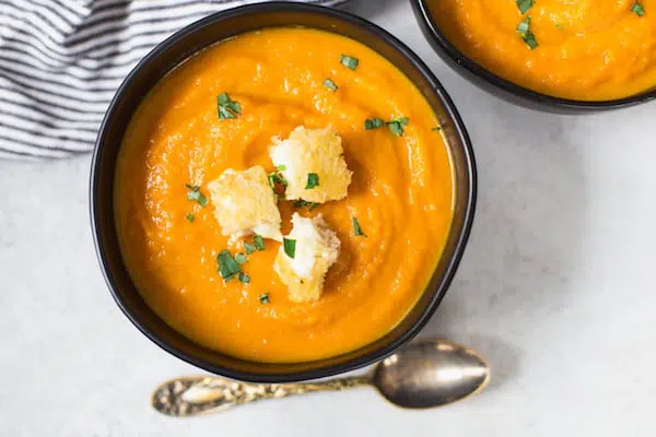 Carrot Leek Soup with Grilled Cheese Croutons Overhead on the Healthy Delicious Soup