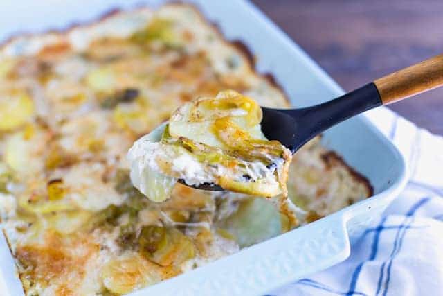 Leek and Gruyere Scalloped Potatoes - Creamy and Inviting Spoon of The Holiday Dish