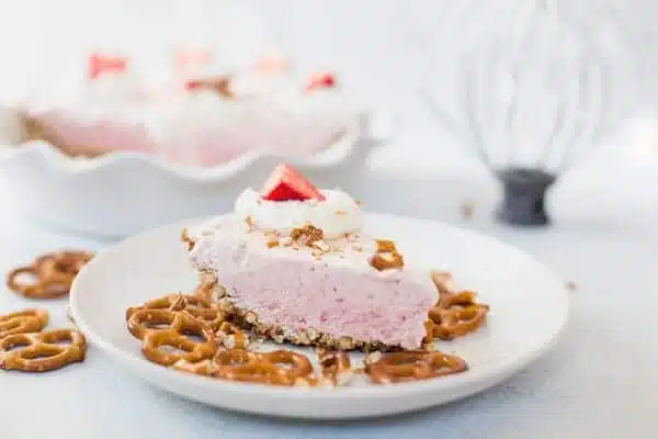 Frozen Strawberry Cream Pie with Pretzel Crust Ready and Served to the Delight of Everyone