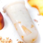 Closeup on the Peach Cheesecake Popsicle on the white background