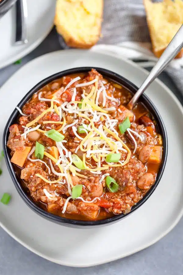 Instant Pot Turkey Quinoa Chili with a Spoon Inside Ready for Dinner