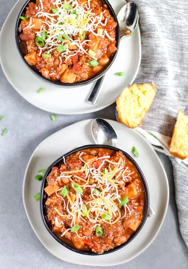 Instant Pot Turkey Quinoa Chili Overhead Shot of Two Bowls Served with Bread
