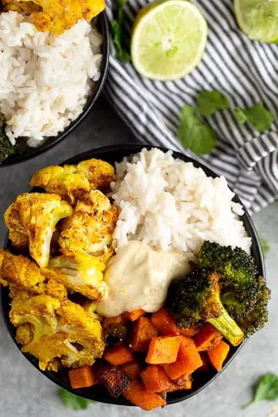 Indian Curry Vegetable Rice Bowls with Curry Yogurt Sauce