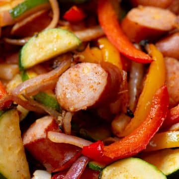 Grilled Cheddar Sausage and Peppers Skillet