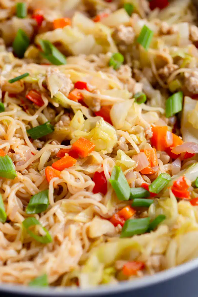 Egg Roll Noodles topped with diced green onions.