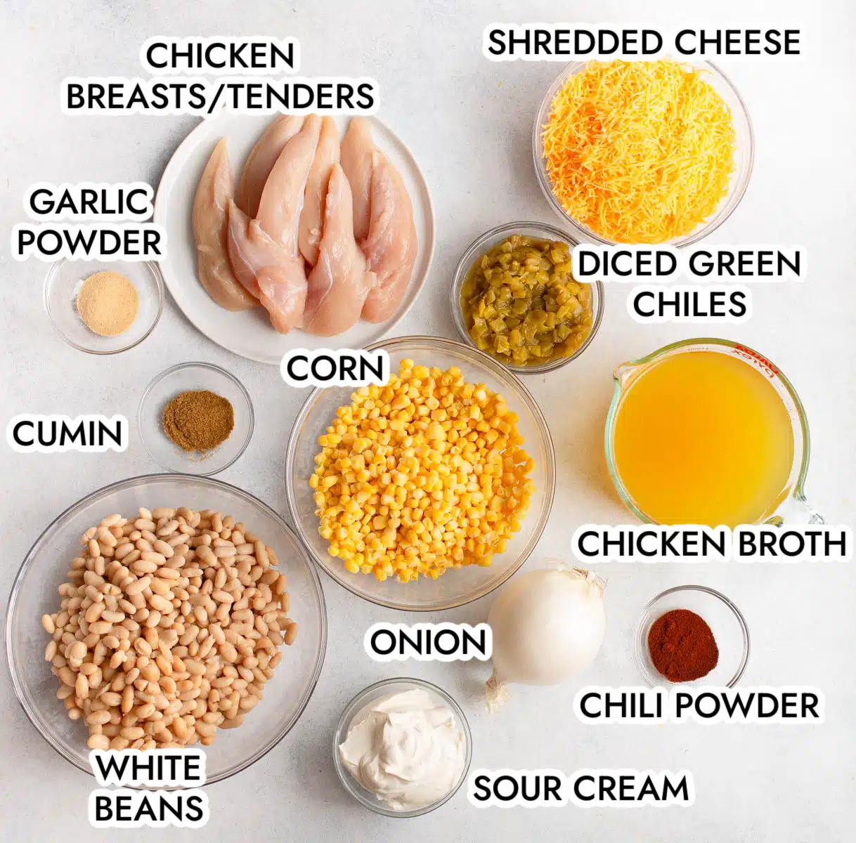 Ingredients in White Chicken Chili on a gray background.