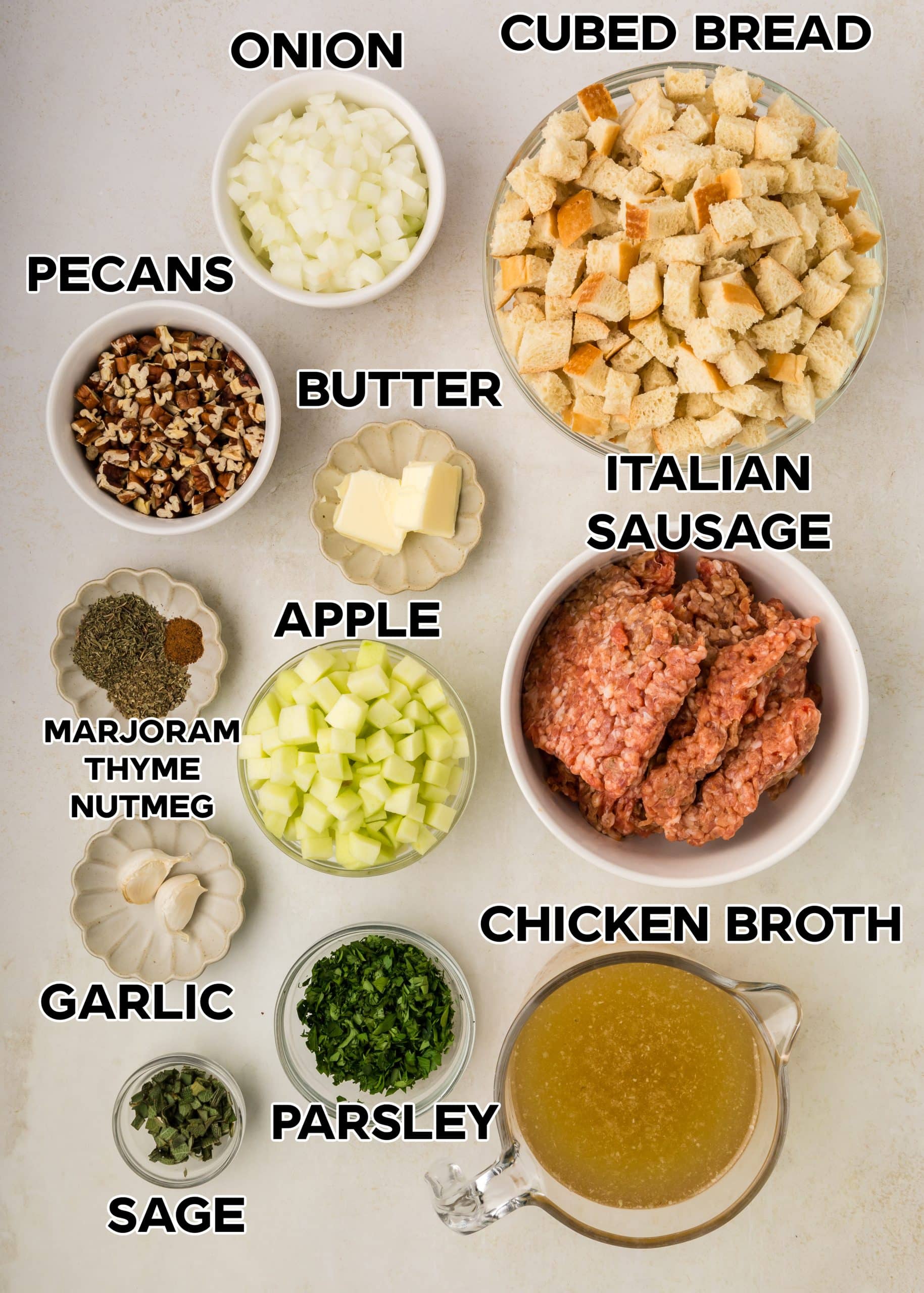 Ingredients in Sausage Pecan Stuffing, all labeled, with a gray background. 