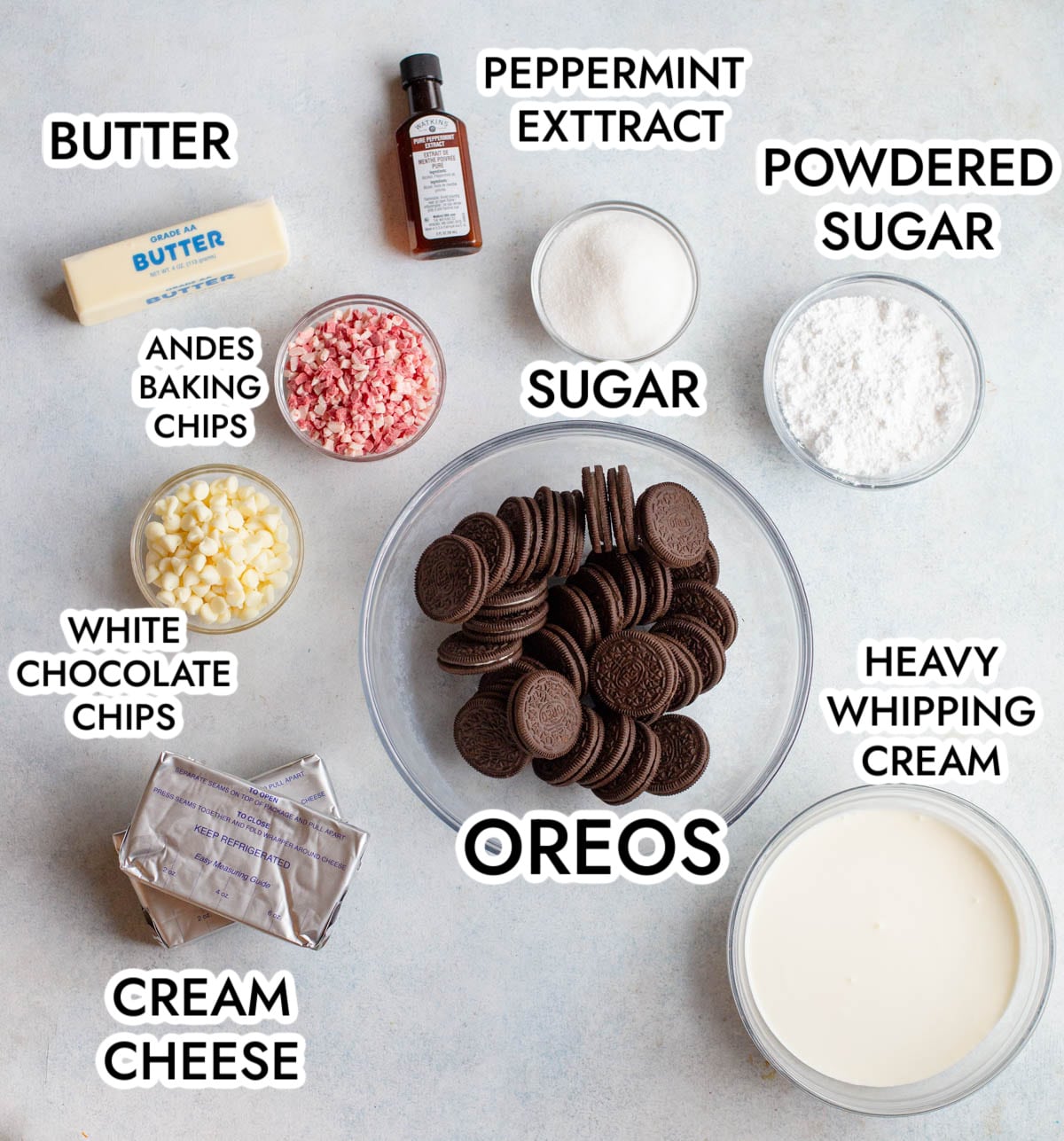 Ingredients in No Bake Peppermint Cheesecake on a gray background. 