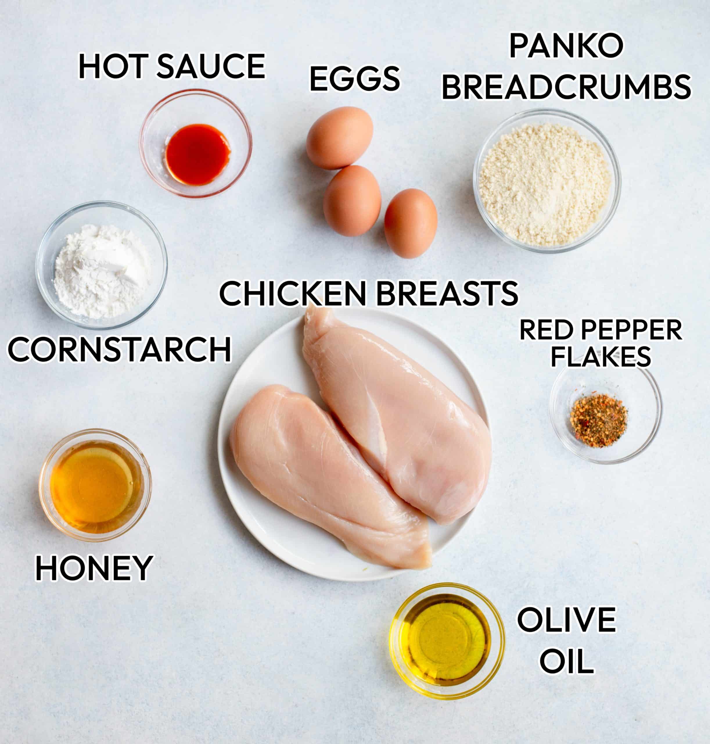 Ingredients in Baked Hot Honey Chicken on a gray background. 