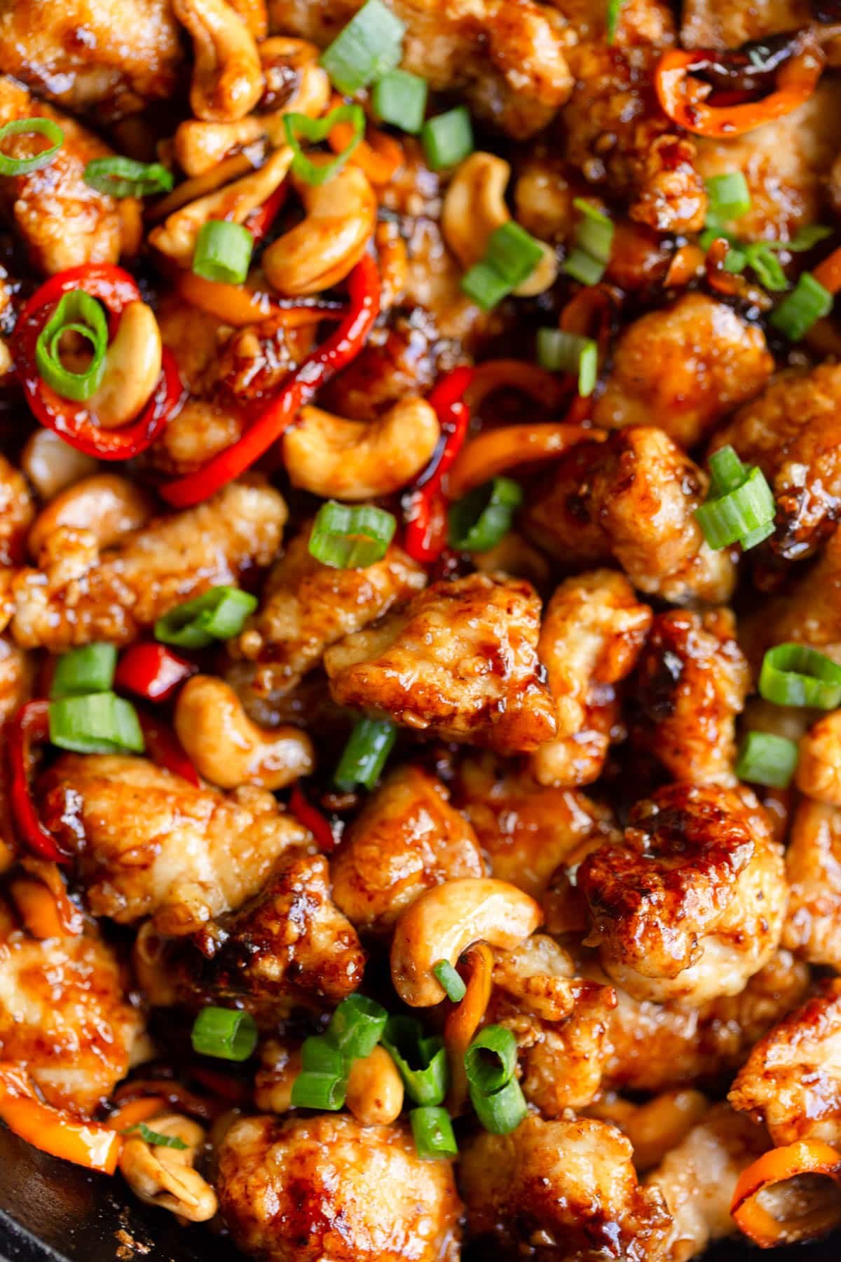 Honey Cashew Chicken topped with green onions.