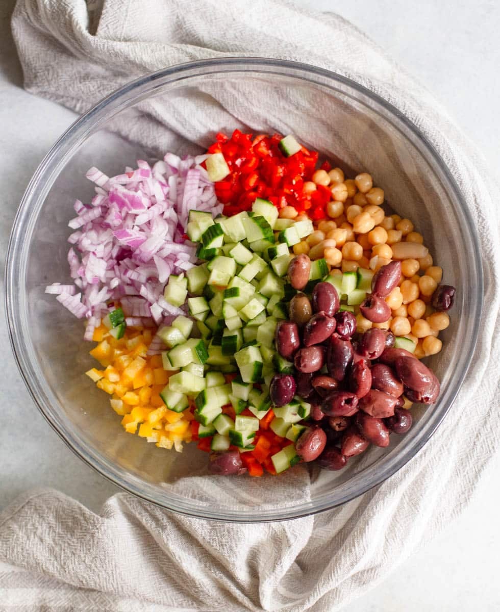 Beans and vegetables in a glass bowl.
