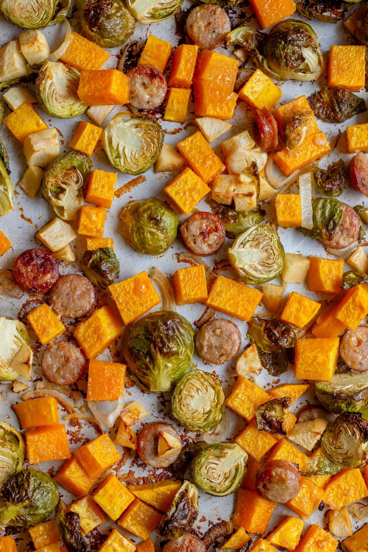 Fall-Inspired Sheet Pan Chicken Sausage and Veggies on a sheet pan. 