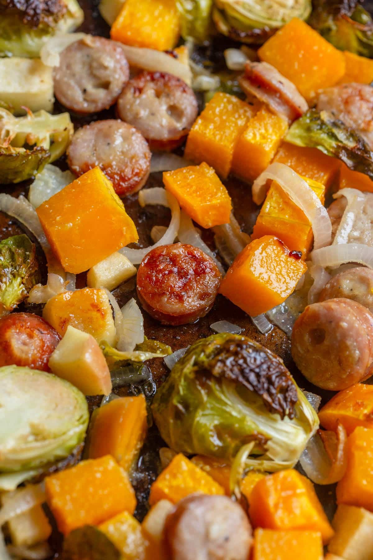 Fall-Inspired Sheet Pan Chicken Sausage and Veggies on a sheet pan. 