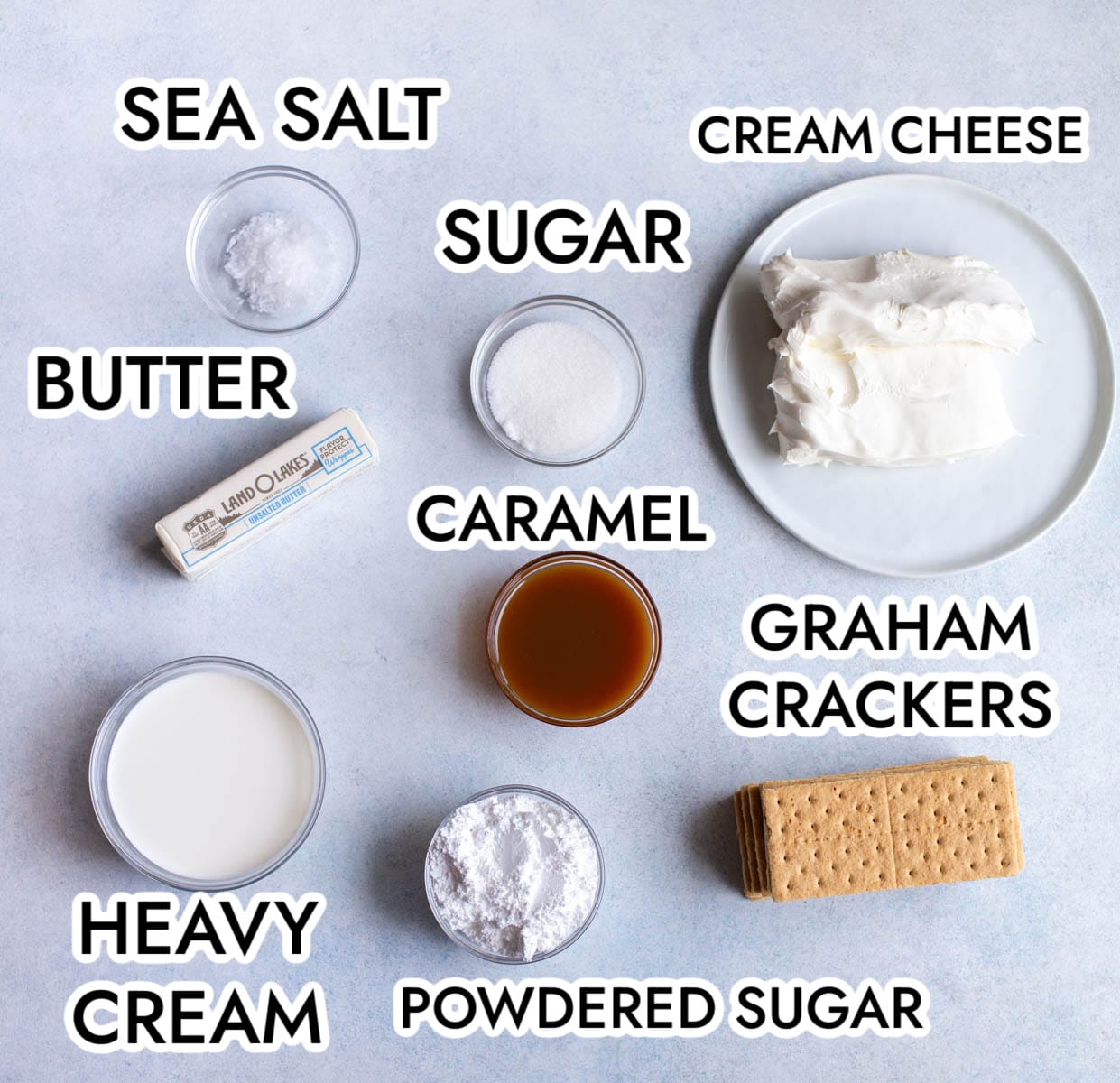 Ingredients in No Bake Salted Caramel Cheesecake on a gray background. 