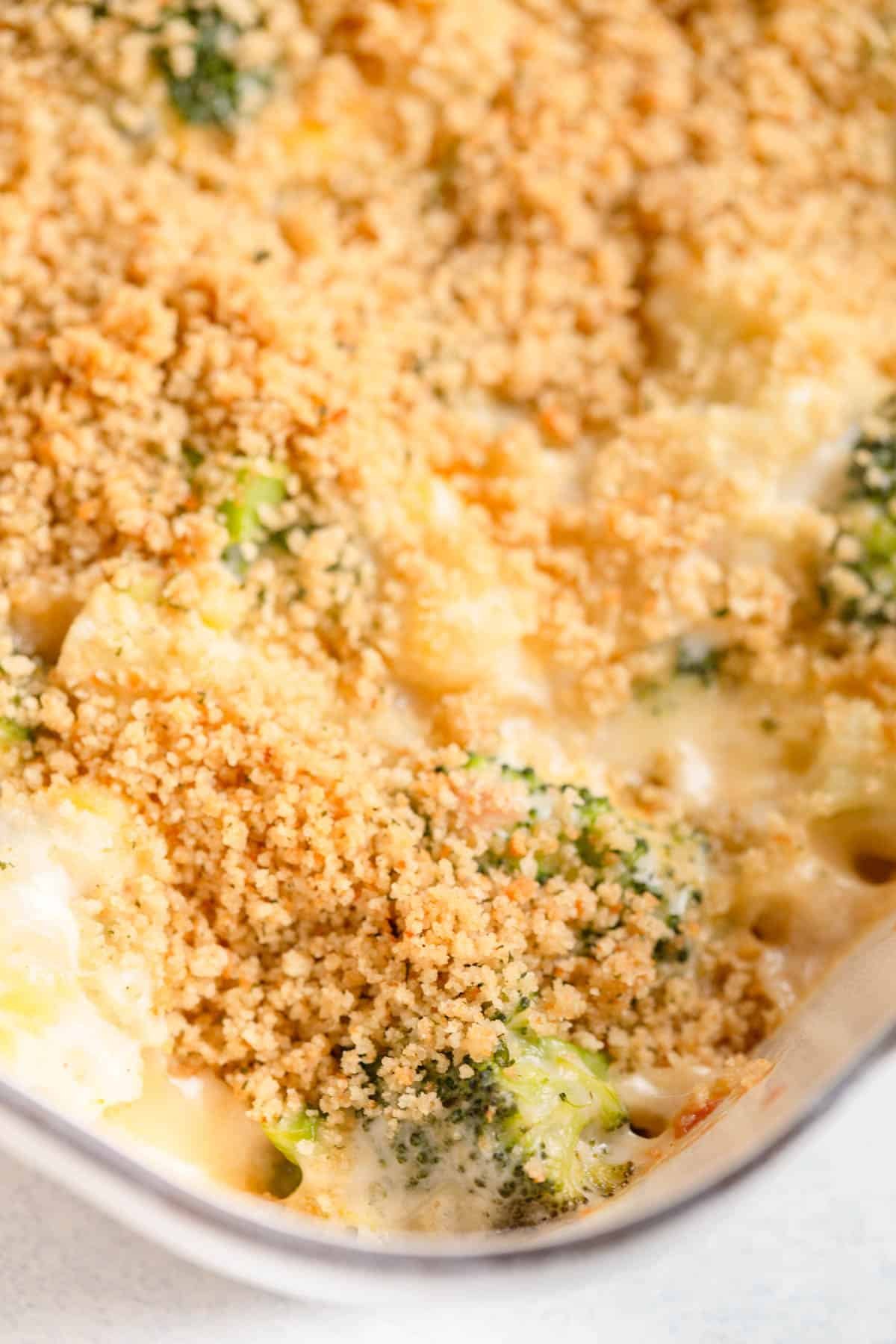 Cheesy Broccoli Cauliflower Casserole in a white baking dish. 