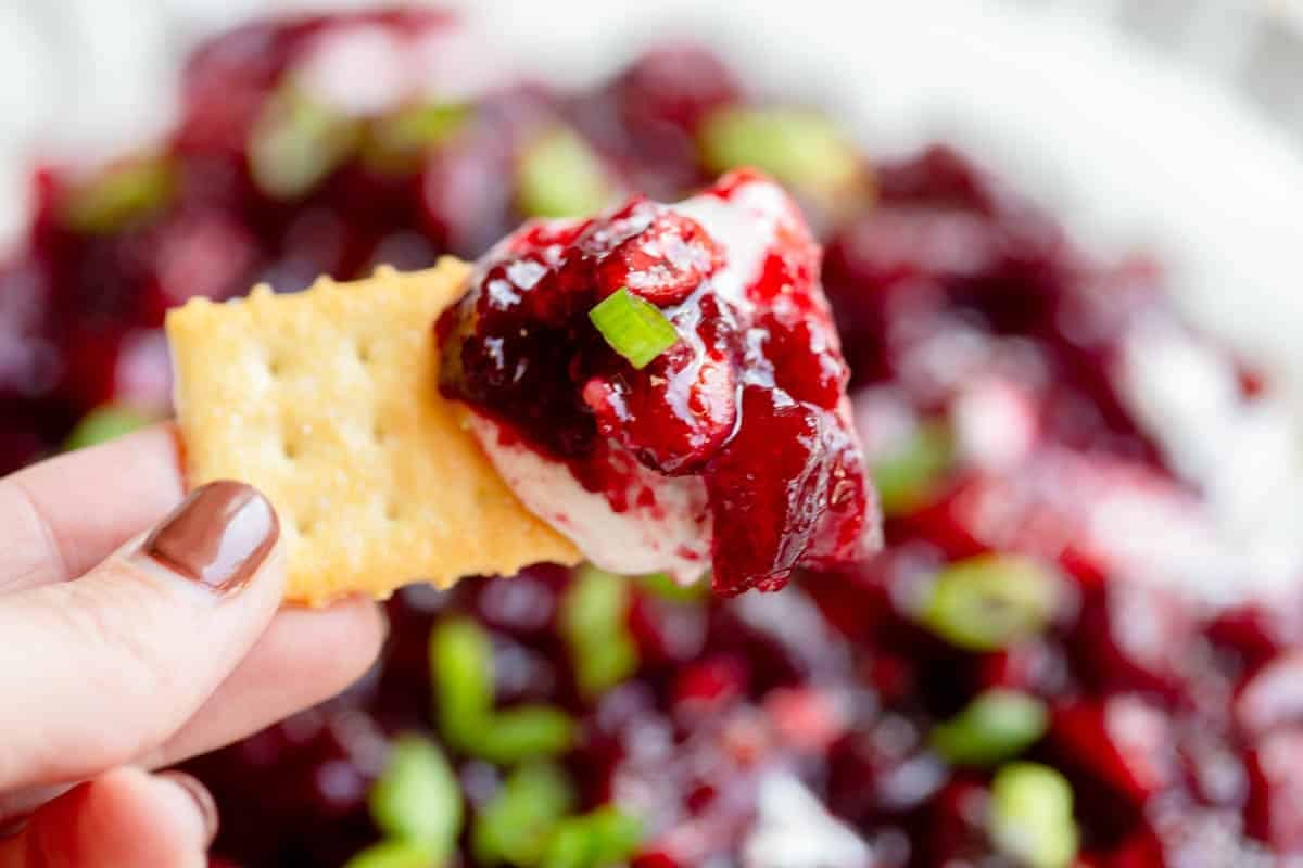 Cranberry Whipped Goat Cheese on a club cracker. 