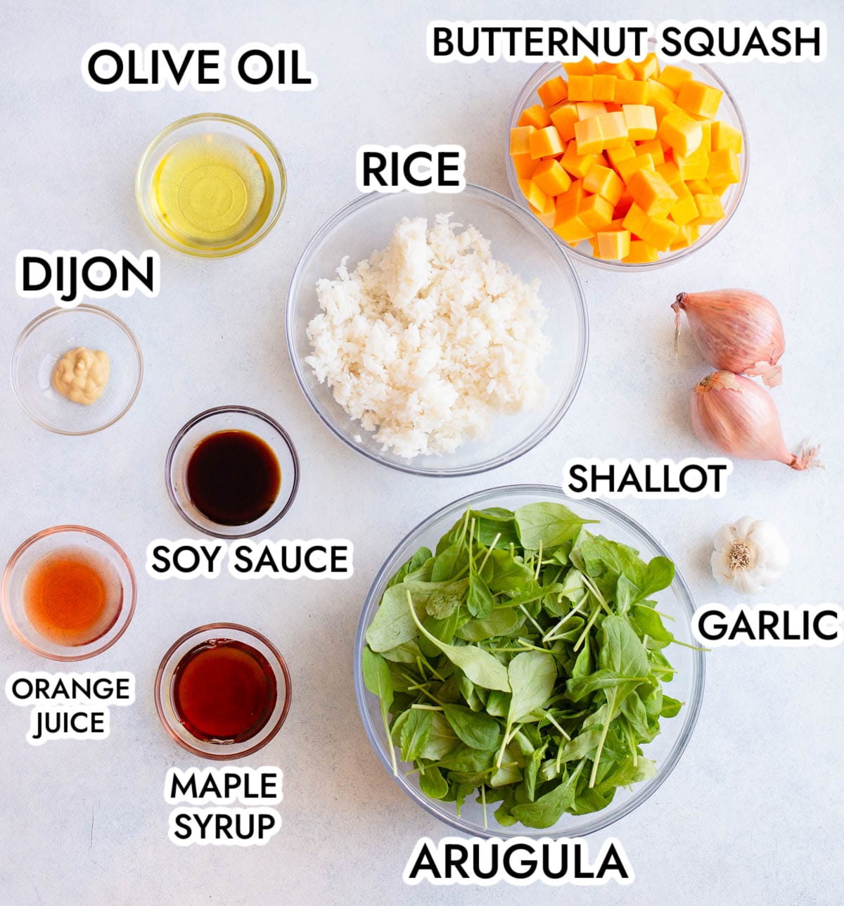 Ingredients in Winter Crispy Rice Salad on a gray background with black text labels.