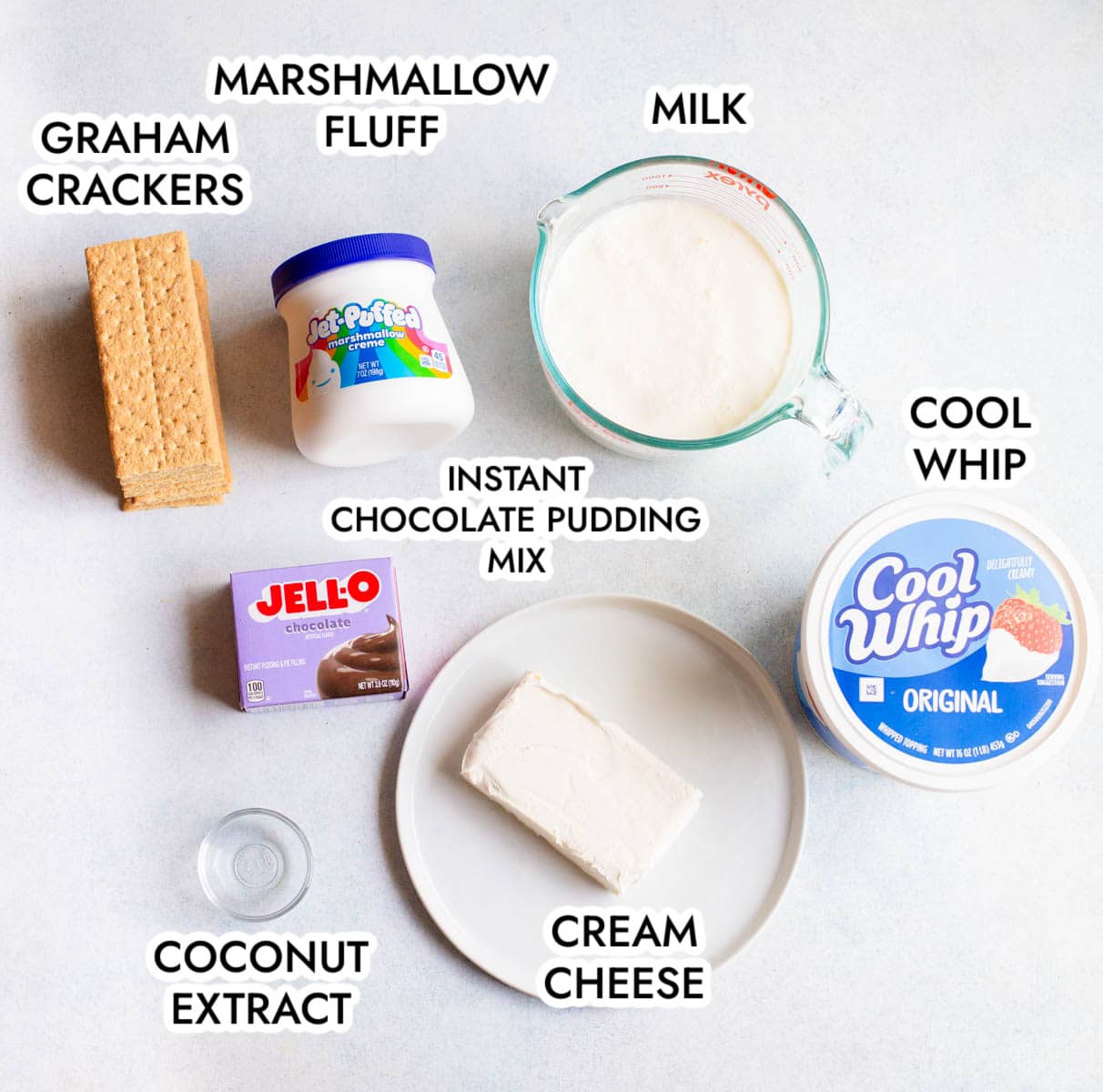 Ingredients in Frozen S'Mores Bars on a gray background labeled with black text.